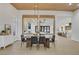 Bright dining area with a modern table, chairs, and a stylish light fixture at 2621 Spalding Dr, Las Vegas, NV 89134