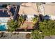 Backyard aerial view with two palm trees, patio, and desert landscaping at 2743 Carolina Blue Ave, Henderson, NV 89052