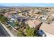 An aerial view showcases a community of single-Gathering homes and blue sky at 2743 Carolina Blue Ave, Henderson, NV 89052