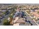 Aerial view of tile roofs and desert landscaping in a community at 2743 Carolina Blue Ave, Henderson, NV 89052