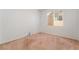 A bedroom offers a large sunny window and neutral carpet flooring at 2743 Carolina Blue Ave, Henderson, NV 89052