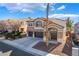 Charming two-story home with a two-car garage and desert landscaping at 2743 Carolina Blue Ave, Henderson, NV 89052