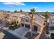 Attractive two-story home showcasing desert landscaping, a tile roof, and a spacious three-car driveway at 2743 Carolina Blue Ave, Henderson, NV 89052