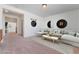 Spacious living area with a comfortable sectional sofa and stylish decor creating a relaxing atmosphere at 2743 Carolina Blue Ave, Henderson, NV 89052