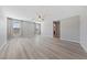 Large bedroom with wood floors, ceiling fan, and natural light from a view to two windows at 2785 Donatello Manor Pl, Henderson, NV 89044