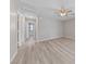 The bedroom has a ceiling fan, light walls, and a door to the bathroom at 2785 Donatello Manor Pl, Henderson, NV 89044