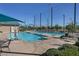 The community pool offers a refreshing escape, complete with lounge chairs and shaded areas at 2785 Donatello Manor Pl, Henderson, NV 89044