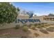 Community sign reading INSPIRADA with native landscaping at 2785 Donatello Manor Pl, Henderson, NV 89044