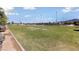 Active community volleyball court on a large green lawn for residents at 2785 Donatello Manor Pl, Henderson, NV 89044