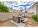 Relaxing hot tub in a private yard setting with desert landscaping, perfect for unwinding after a long day at 2812 Mirage Rd, Henderson, NV 89074