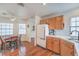 Open-concept kitchen with an adjacent dining area and ample cabinet space at 2812 Mirage Rd, Henderson, NV 89074