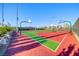 A full basketball court with multiple hoops sits in a modern community, offering residents recreational opportunities at 2844 Alenga St, Henderson, NV 89044