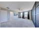Bright, airy bedroom with gray carpet and lots of natural light; includes a walk-in closet and stylish decor at 2844 Alenga St, Henderson, NV 89044