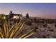 A modern community park at dusk offers a serene setting for relaxation and outdoor activities with picturesque mountain views at 2844 Alenga St, Henderson, NV 89044