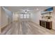 Inviting living room with hardwood floors, neutral walls, open space, and stylish furniture creates a welcoming atmosphere at 2844 Alenga St, Henderson, NV 89044