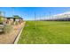 A well-maintained volleyball court surrounded by lush greenery and trees offers residents an active outdoor recreational space at 2844 Alenga St, Henderson, NV 89044