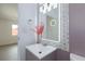 Upgraded vanity features a modern mirror, stylish decor, and great lighting at 3008 Lawndale St, Las Vegas, NV 89121