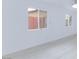 Well-lit bedroom featuring light floors, bright windows, and white walls at 3008 Lawndale St, Las Vegas, NV 89121