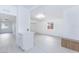 Bright, open-concept living room with white walls, light floors, and modern fixtures at 3008 Lawndale St, Las Vegas, NV 89121