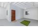 Enclosed patio space with patterned metal fencing and an artificial turf rug outside the door at 3008 Lawndale St, Las Vegas, NV 89121