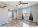 Neutral bedroom with closet, ceiling fan, view of the backyard and modern decor at 304 Jolly January Ave, Las Vegas, NV 89183