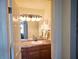 Well-lit bathroom with decorative mirror and granite countertops at 3550 Bay Sands Dr # 3056, Laughlin, NV 89029