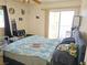 This bedroom has neutral walls, ceiling fan and sliding door to balcony at 3550 Bay Sands Dr # 3056, Laughlin, NV 89029