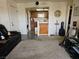 Inviting living area blending seamlessly with the kitchen, enhanced by a guitar and other personal touches at 3550 Bay Sands Dr # 3056, Laughlin, NV 89029