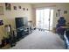 Relaxed living room with a sliding door to a patio and space for entertainment at 3550 Bay Sands Dr # 3056, Laughlin, NV 89029
