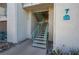 Exterior view of a stairway with light-green railings leading to upper units at 3550 Bay Sands Dr # 3056, Laughlin, NV 89029