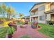 Inviting backyard patio area with comfortable seating and a cozy fire pit, perfect for outdoor gatherings at 3784 Cheryl Lynne Ct, Las Vegas, NV 89139