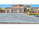 Gorgeous two-story home with a large driveway and attached three-car garage at 3784 Cheryl Lynne Ct, Las Vegas, NV 89139