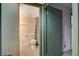 View of a bathroom featuring a toilet and patterned shower curtain at 4140 Gannet Cir # 255, Las Vegas, NV 89103