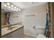 Bathroom with vanity, large mirror, and colorful shower curtain at 4140 Gannet Cir # 255, Las Vegas, NV 89103