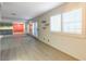 Spacious living room featuring new floors and a wall mirror at 4140 Gannet Cir # 255, Las Vegas, NV 89103