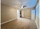 Bright bedroom featuring light tile flooring and closet at 4194 Greenpoint St, Las Vegas, NV 89147