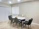 Bright dining room with stylish furniture and plank flooring at 4194 Greenpoint St, Las Vegas, NV 89147