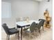 Chic dining area featuring a modern table with stylish chairs and plank flooring at 4194 Greenpoint St, Las Vegas, NV 89147