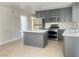 Updated kitchen featuring stainless steel appliances and light countertops at 4194 Greenpoint St, Las Vegas, NV 89147