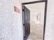 Inviting entrance features a newly remodeled interior with modern floors and an abundance of natural light at 45 Maleena Mesa St # 327, Henderson, NV 89074