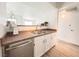 Updated kitchen with stainless steel sink and modern cabinets at 45 Maleena Mesa St # 327, Henderson, NV 89074