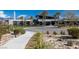 Beautiful clubhouse featuring modern architecture, desert landscaping, and a bright, sunny atmosphere at 4743 S Sungold St, Pahrump, NV 89061