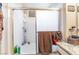Cozy bathroom features a shower-tub combination with white tiles at 4960 Harrison Dr # 131, Las Vegas, NV 89120