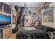 Charming bedroom with unique decor, including posters and memorabilia adorning the walls for a personalized touch at 4960 Harrison Dr # 131, Las Vegas, NV 89120