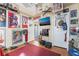 Quirky bedroom features posters, movie-themed decor, and personal touches for a unique and interesting space at 4960 Harrison Dr # 131, Las Vegas, NV 89120