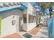 Charming condo exterior features a walkway, secure entrance, and well-maintained landscaping at 4960 Harrison Dr # 131, Las Vegas, NV 89120