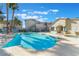 A sparkling blue pool with lounge seating offers a refreshing retreat and community gathering space at 4960 Harrison Dr # 131, Las Vegas, NV 89120
