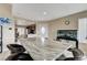 Bright dining area featuring a large counter with seating and an aquarium at 4977 Vacaville Ave, Las Vegas, NV 89139