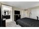 Spacious bedroom featuring an adjacent bathroom and ample closet space at 4977 Vacaville Ave, Las Vegas, NV 89139