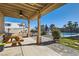 View of the backyard patio that includes a picnic table, grill, pool, and fenced-in yard at 525 Sunnys Halo Ct, Henderson, NV 89015